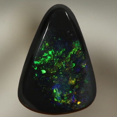 SOLID BLACK OPAL Burning copper orange contrasted by bottle green, always sparkling